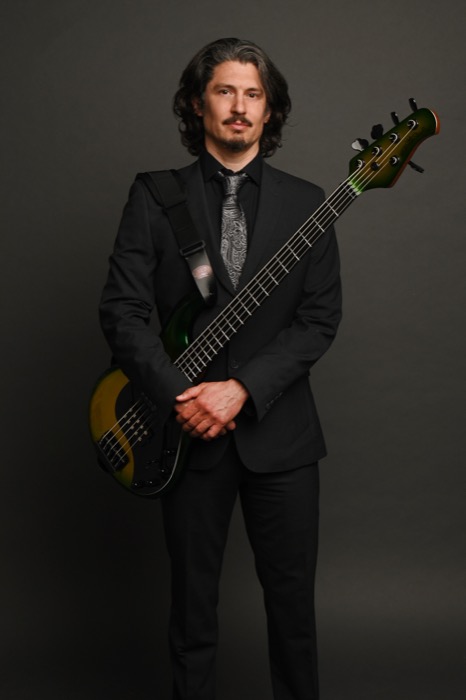 Stephen McQuay holding bass